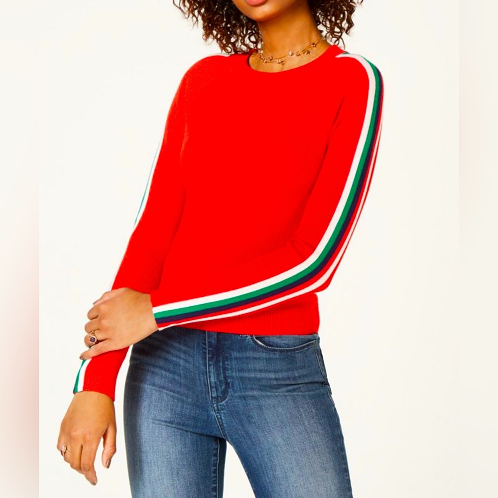 Red sweater with four stripes on sides. High fashion